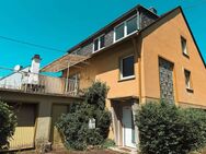 Freistehendes Einfamilienhaus mit 4 Garagen und viel Potenzial - Koblenz