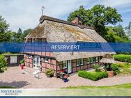 Wiefelstede: Stilvolles Ein-/Zweifamilienhaus unterm Reetdach mit parkähnlichem Anwesen, Obj. 6996 - Wiefelstede