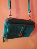 Kleine grüne Tasche aus Leder in 90419