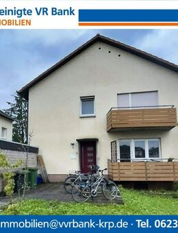 Vermietetes Zweifamilienhaus mit großem Garten - Oftersheim