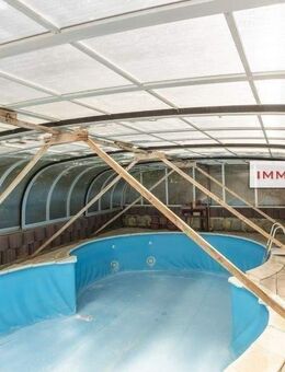 IMMOBERLIN.DE - Toplage! Individuelles Ein-/Zweifamilienhaus mit attraktivem Ausbaupotential, Südgarten & 4 Garagen - Berlin