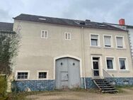 Dieses komplett vermietete Bauernhaus befindet sich in einer Nebenstrasse im Losheimer Ortsteil Bachem - Losheim (See)