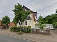 Großzügige 4-Zimmer-Erdgeschosswohnung mit Terrasse, Garten und Garage - Munster