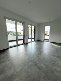 Wasserbilligerbrück: Grenznahes Wohnen im repräsentativen Neubau + Barrierefreie WE01 mit 80,55 m² Wfl. und großer Terrasse + KfW-55-EE