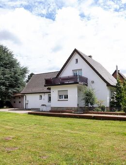 Wohnen und Arbeiten - vielseitiges Haus mit großem Grundstück und Potenzial in Hasbergen - Hasbergen