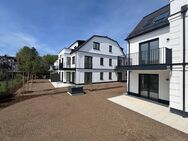 BEZUGSFERTIG - Großzügige Zimmer-EG-Wohnung mit taghellem Souterrain und großem Privatgarten - München