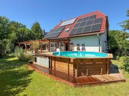 Nachhaltig wohnen - Einfamilienhaus mit Kamin, Pool & PV-Anlage - Heidgraben