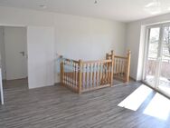 4-Zimmer-Wohnung mit Balkon, Einbauküche, wohnlichen Räumen im Souterrain & Stellplatzoption - Parchim