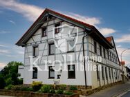 Reduziert + Wohnhaus mit ausbaubaren Anbau und Womo-Garage - Stadtlauringen