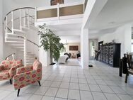 Exklusive Architektur trifft auf großzügiges Wohnen in gesuchter Lage - Rosbach (Höhe)