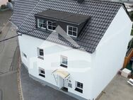 Genießen Sie modernes Wohnen: Exklusives Einfamilienhaus mit beeindruckender Dachterrasse - Riol