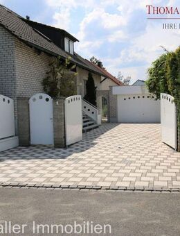 Exklusives Zweifamilienhaus mit 3 Einheiten, Erdwärmepumpe & Wellnessbereich in ruhiger Lage - Seukendorf