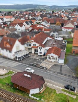 Mehrfamilienhaus mit Lager und Gewerbe - Glauburg
