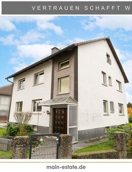 Freistehendes Zweifamilienhaus mit ausgebautem Dachgeschoss und großzügigem Garten - Florstadt