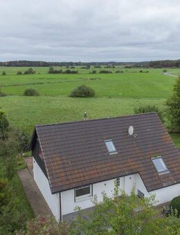 Charmantes Einfamilienhaus im Split-Level-Stil mit Weitblick über die Felder von Königshügel - Meggerdorf