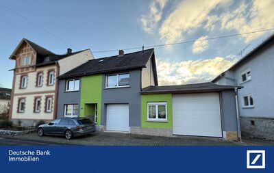 Familienfreundliche Doppelhaushälfte mit großzügiger Wohnmobilgarage!