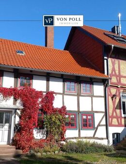 Liebevoll restaurierte Hofstelle mit zwei Fachwerkhäusern und gepflegtem Garten/erschl. Bauplatz - Denkte