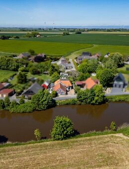 Haus in schöner Wasserlage mit viel Potenzial und großzügigem Garten in Wittmund/Neufunnixsiel - Wittmund