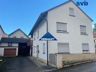 Verkauft - Solides Zweifamilienhaus mit Scheune+Garagen im historischen Ortskern der Stadt Baunach - Baunach