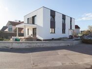 Neues Zweifamilienhaus mit Garten in Großmehring - Großmehring