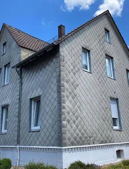 1-Familienwohnhaus mit Garage und möglichem Bauplatz in stadtnaher Wohnlage von Holzminden - Holzminden