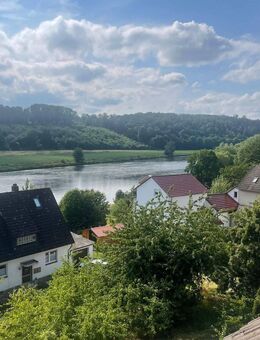 Wohlfühloase in naturnaher Lage !! Zweifamilienhaus mit fantastischem Fuldablick in Bergshausen - Fuldabrück