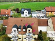 Bezugsfrei: Schicke, helle Maisonettewohnung mit Dachstudio, Balkon und Stellplätzen! - Eisingen (Bayern)