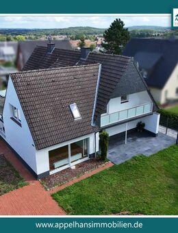 Lichtdurchflutete Wohnung mit Einfamilienhaus-Charme und Garten - Hasbergen