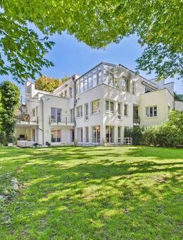 Isar-Exklusivität pur - Maisonette mit 430 m² Privatgarten und Haus-Charakter - München