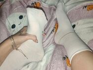 Diverse getragene Socken und heiße Bilder - Köln