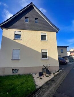 Wohnhaus mit Nebengebäude und Gartengrundstück - Philippsthal (Werra)