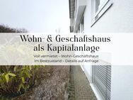 Attraktives Investment: Haus mit zwei Wohneinheiten, Gewerbefläche und vielen Stellplätzen in Wehrheim - Wehrheim