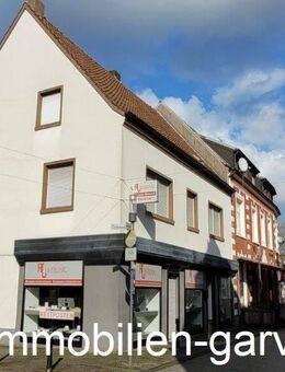 Zentral! Wohn- und Geschäftshaus mit zweigeschossiger Wohnung, Terrasse und 2 Ladenlokalen in Borken - Borken