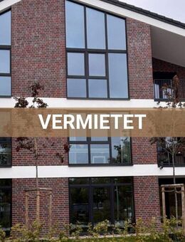 Wohnen am Norder Tief: Schöne Erdgeschosswohnung mit Blick auf die Mühle! ERSTBEZUG - Norden