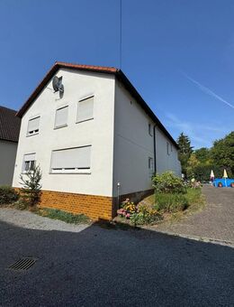 Mehrfamilienhaus mit zwei vermieteten Wohneinheiten, PV-Anlage & Ausbaupotenzial in Eichenhausen - Wülfershausen (Saale)
