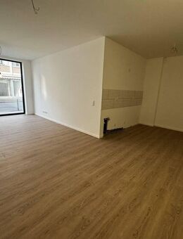 RIDA FLATS - Lichtdurchflutete Erdgeschosswohnung mit großen Fensterfronten in zentraler Lage - Kerpen (Kolpingstadt)