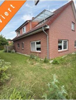 Dörverden-Wahnebergen: Zuverlässig vermietetes Zweifamilienhaus mit Doppelgarage in ruhiger Wohnlage - Dörverden