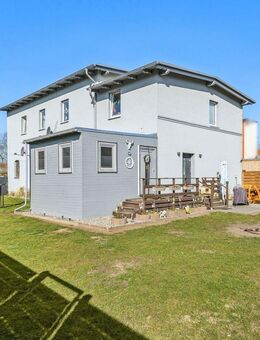 Charmantes Einfamilienhaus mit kleiner Gewerbeeinheit auf ca. 1.094 m² Eigengrundstück in Jarmen - Jarmen