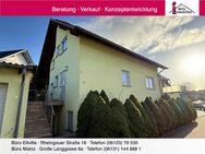 Freistehendes, massiv gebautes Einfamilienhaus mit Blick in schöner Lage von Nieder-Olm - Nieder-Olm