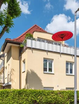 AIGNER - Lichtdurchflutete Dachgeschosswohnung mit sonnigem Balkon - München