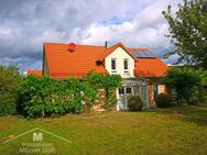 Großzügiges Einfamilienhaus mit Garage u. Carport in sonniger Naturlage von Haunstetten - Kinding