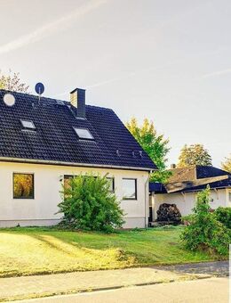 Ein-/Zweifamilienhaus in ruhiger Wohngegend mit nahezu ebenerdigem Gartengrundstück und Doppelgarage - Weyerbusch