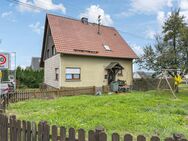 Freistehendes Einfamilienhaus mit großen Grundstück zum selbst verwirklichen in Langenbach - Langenbach (Kirburg)