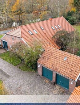 Freistehendes Einfamilienhaus mit viel Platz und einer Einliegerwohnung direkt am Kanal. OBJ. 9149 - Barßel