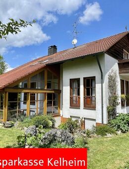 Großzügiges Einfamilienhaus mit Einliegerwohnung, Wintergarten und Baugrundstück in Ihrlerstein - Ihrlerstein