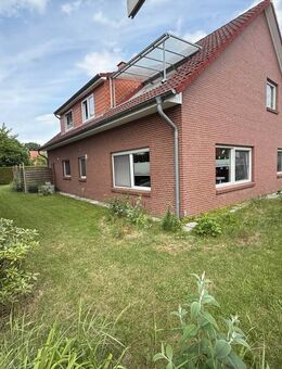 Dörverden-Wahnebergen: Zuverlässig vermietetes Zweifamilienhaus mit Doppelgarage in ruhiger Wohnlage - Dörverden