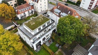 Zwei Mehrfamilienhäuser mit 21 Wohnungen und gemeinsamer Tiefgarage