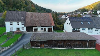 Seltene Gelegenheit: Großes Grundstück mit Einfamilienhaus und Scheune in Toplage!