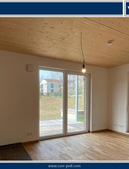 Neubauwohnung mit großem Garten, Terrasse und Tiefgarage - Oettingen (Bayern)