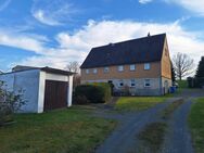 Einfamilienhaus mit Garage und Doppelcarport - Großschirma